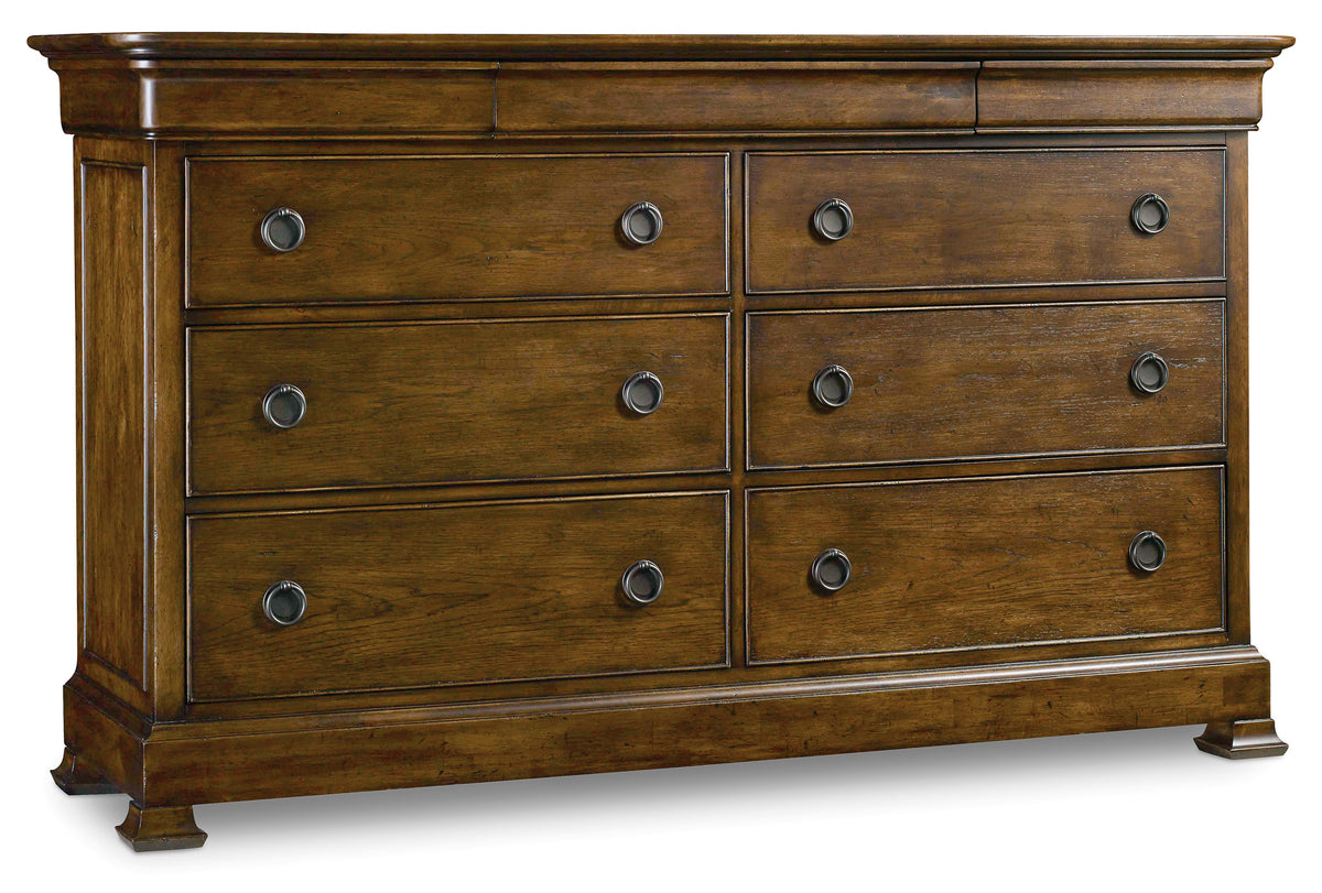 a wooden dresser with drawers