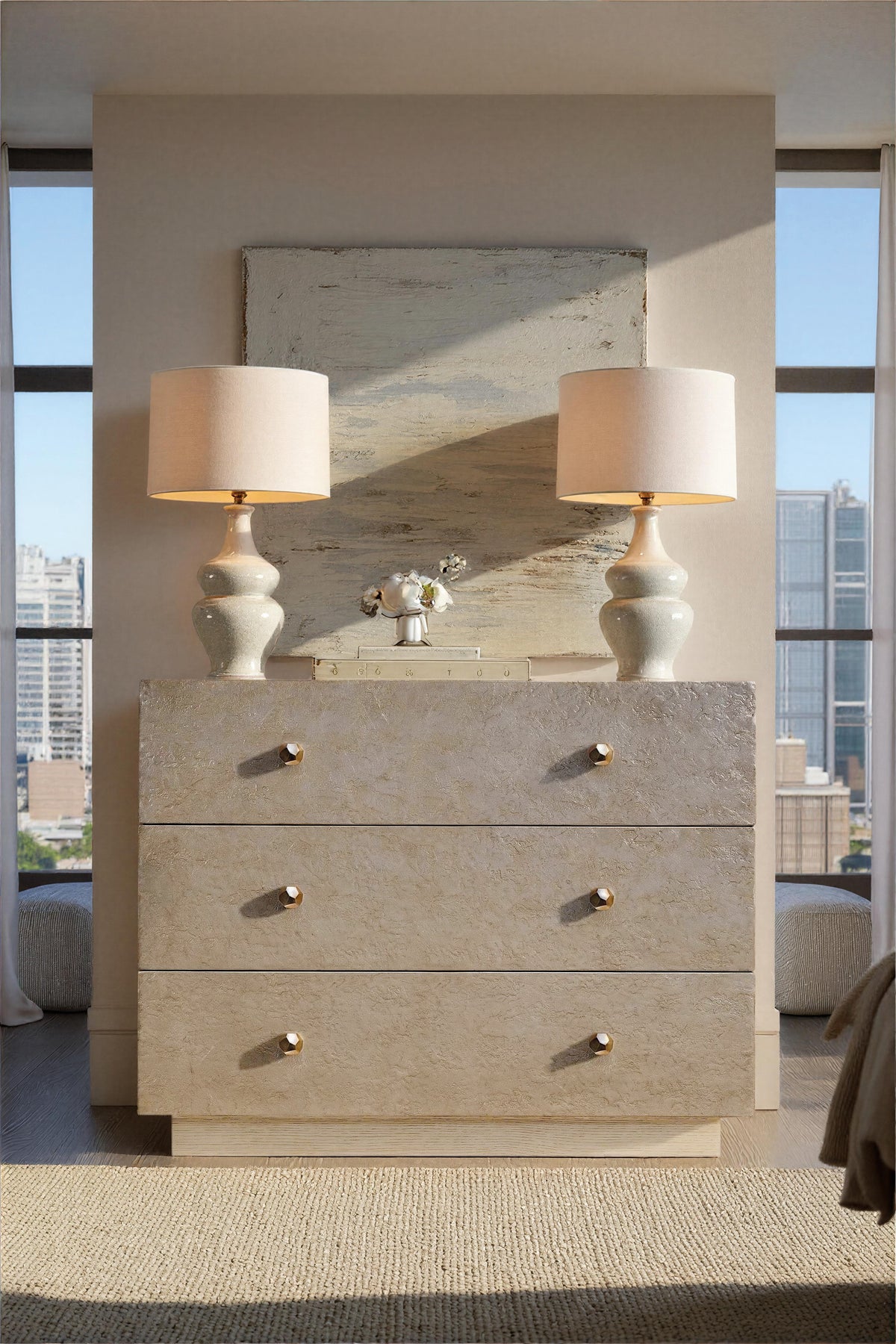 a dresser with two lamps on top