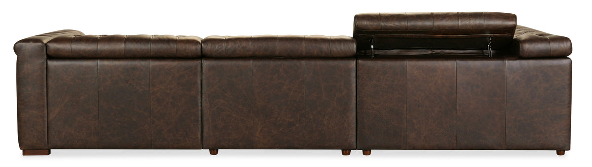 a brown leather couch with arm rest
