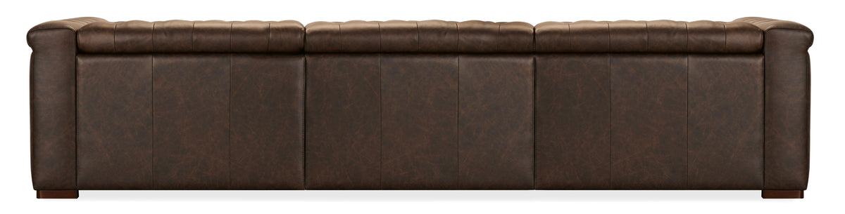 the back of a brown leather couch
