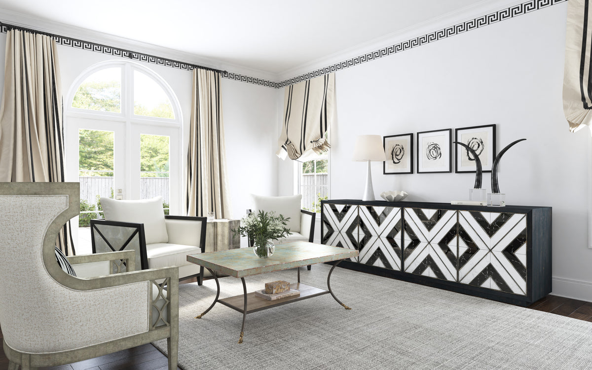 a living room with a black and white cabinet and chairs