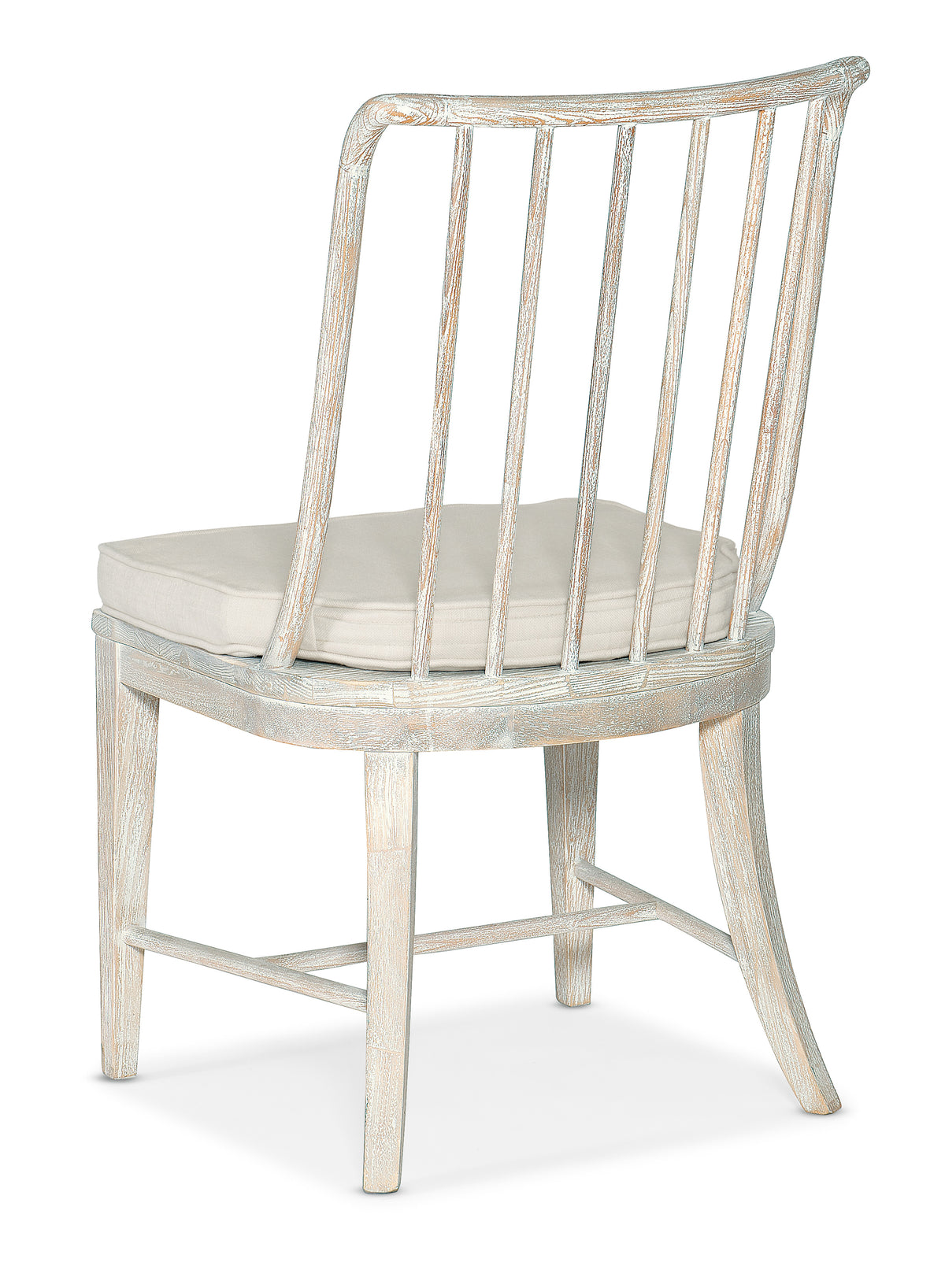 a white chair with a cushion