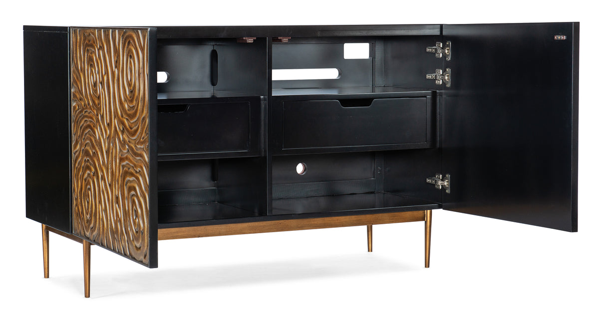 a black entertainment center with a carved design
