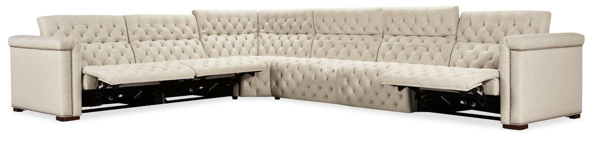a white couch with a side table