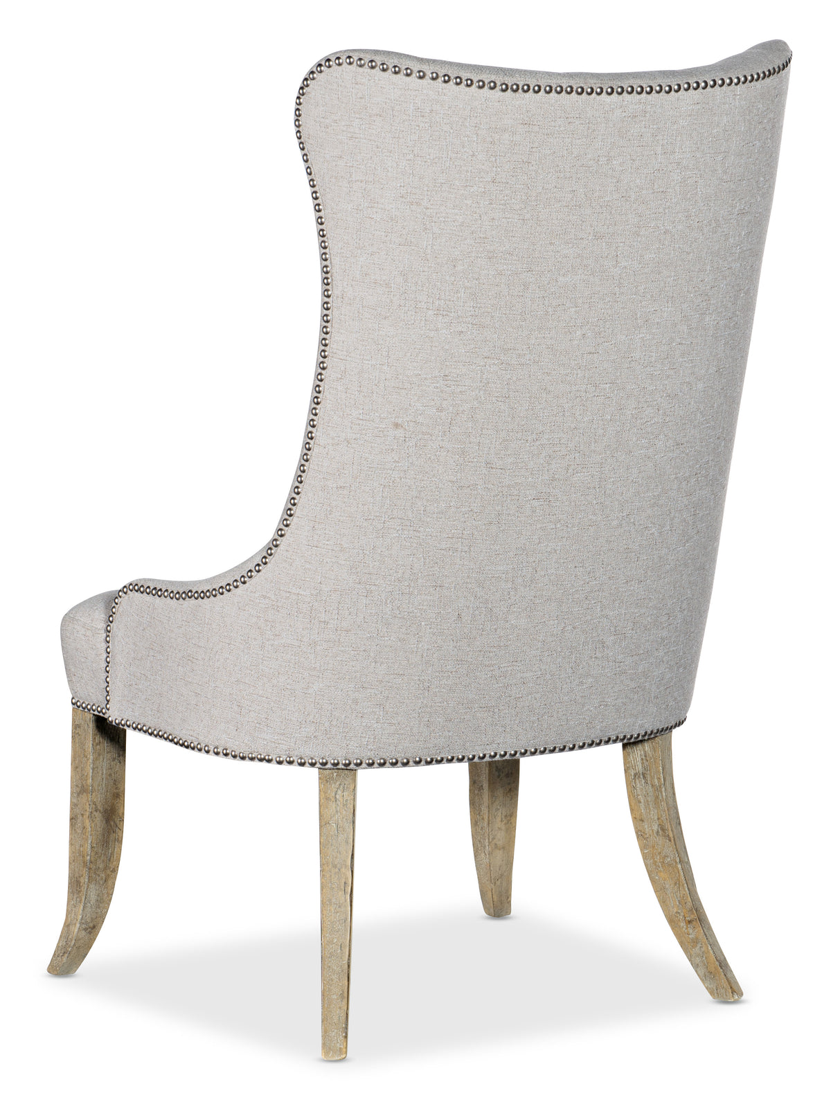 a white chair with wooden legs