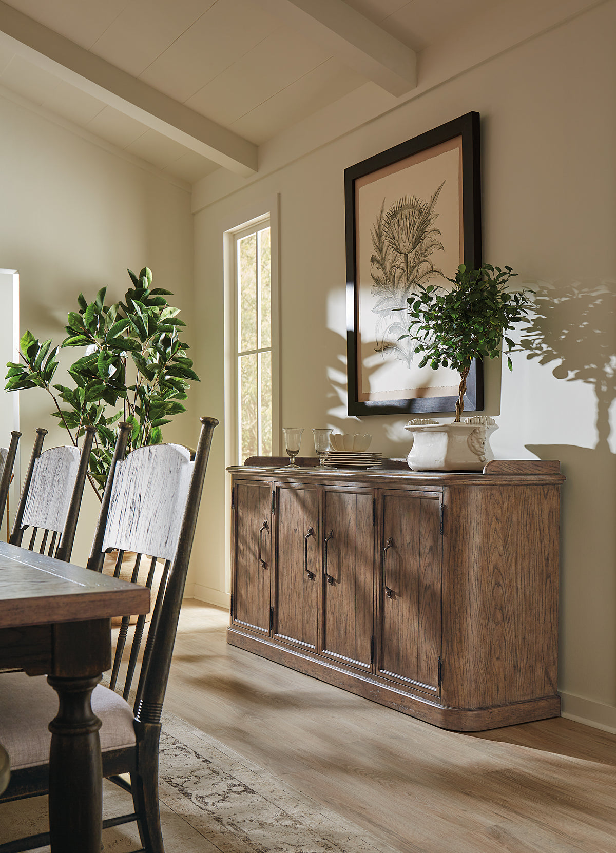 a dining room with a table and chairs