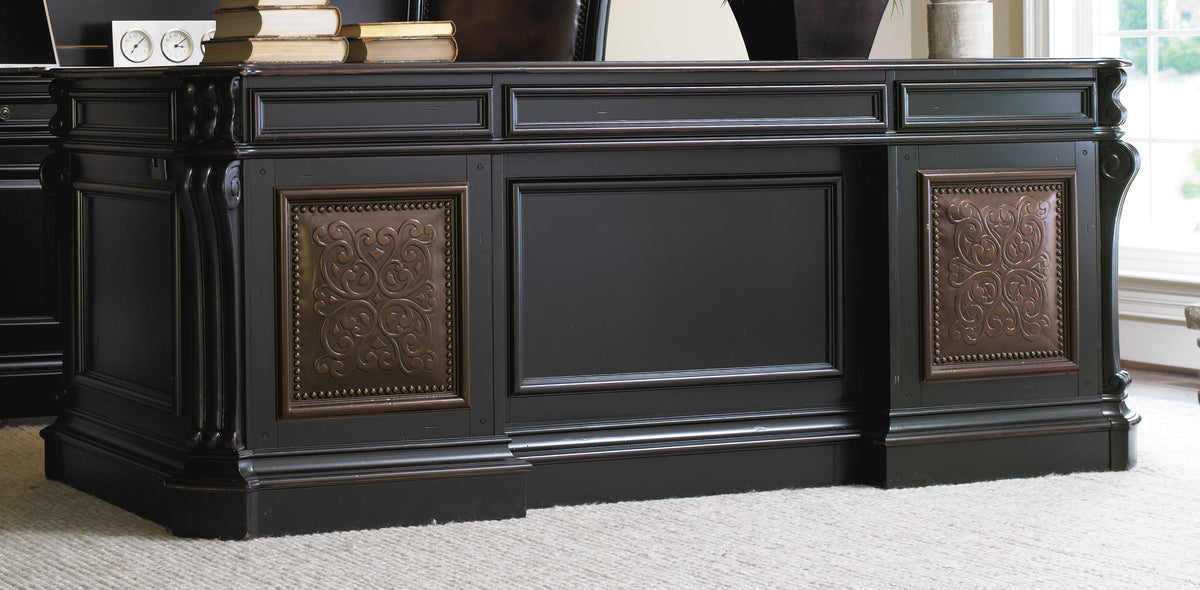 a black cabinet with books on top