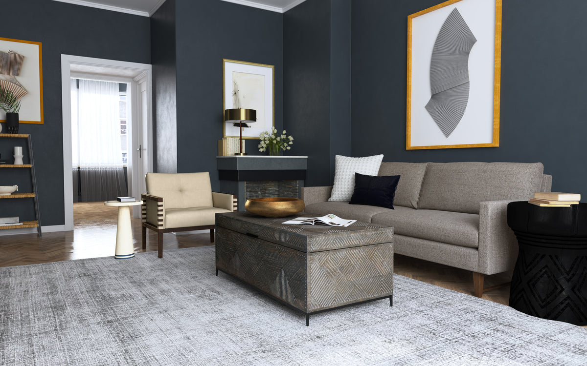 a living room with a couch and a fireplace