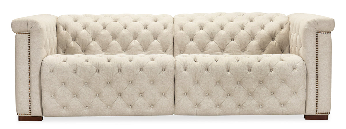 a white couch with buttons
