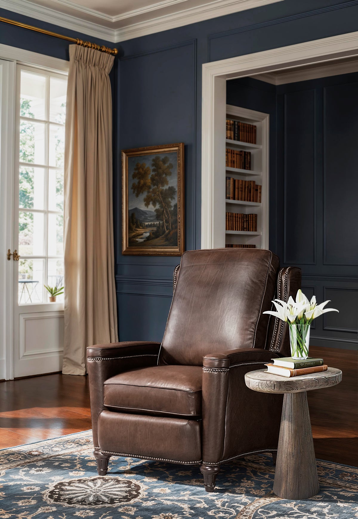 a brown leather chair in a room