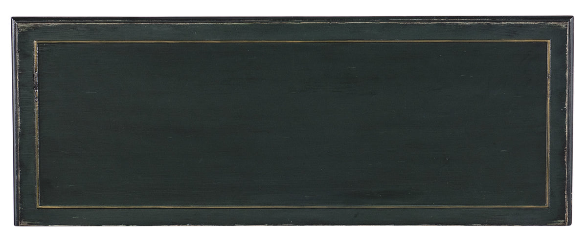a black rectangular object with gold trim
