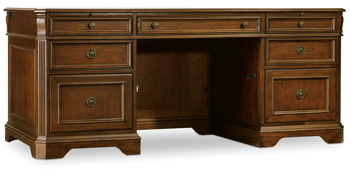a wooden desk with drawers