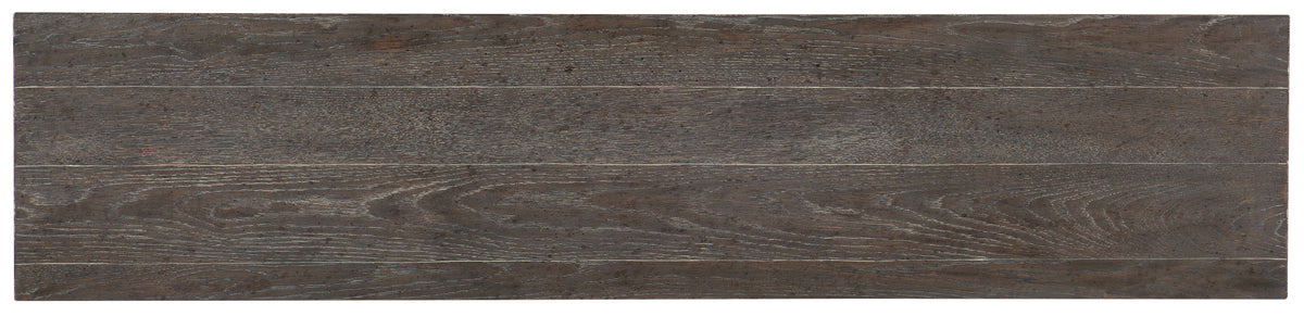 a close up of a wood surface with Nazca Lines in the background