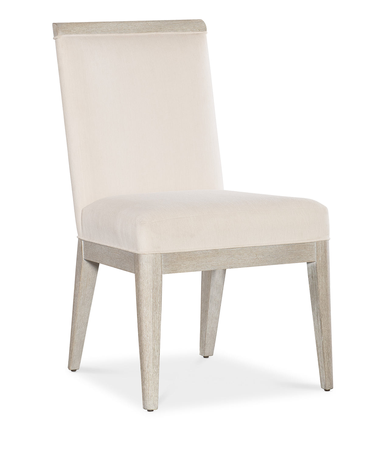 a white chair with wooden legs
