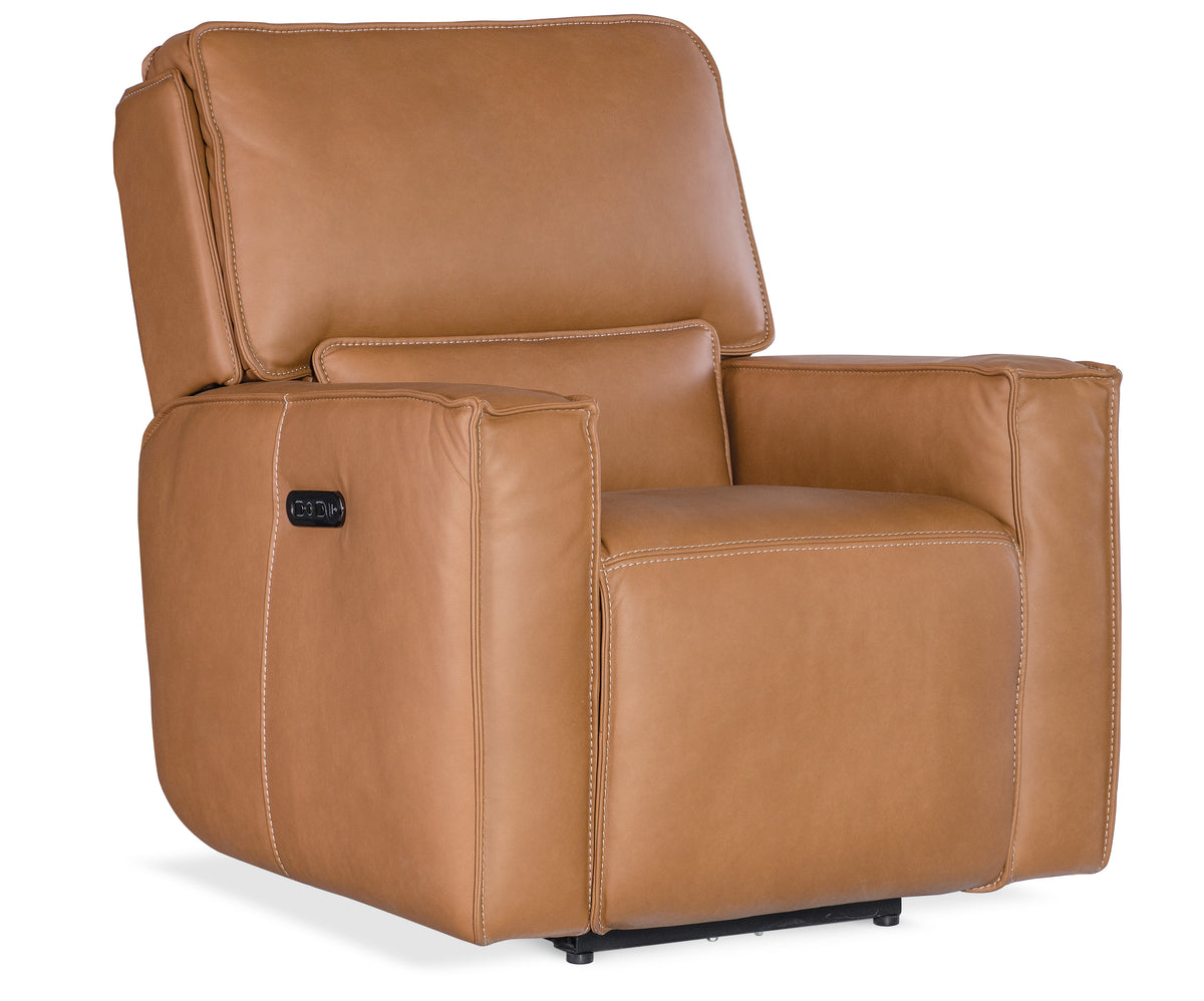 a brown leather recliner chair