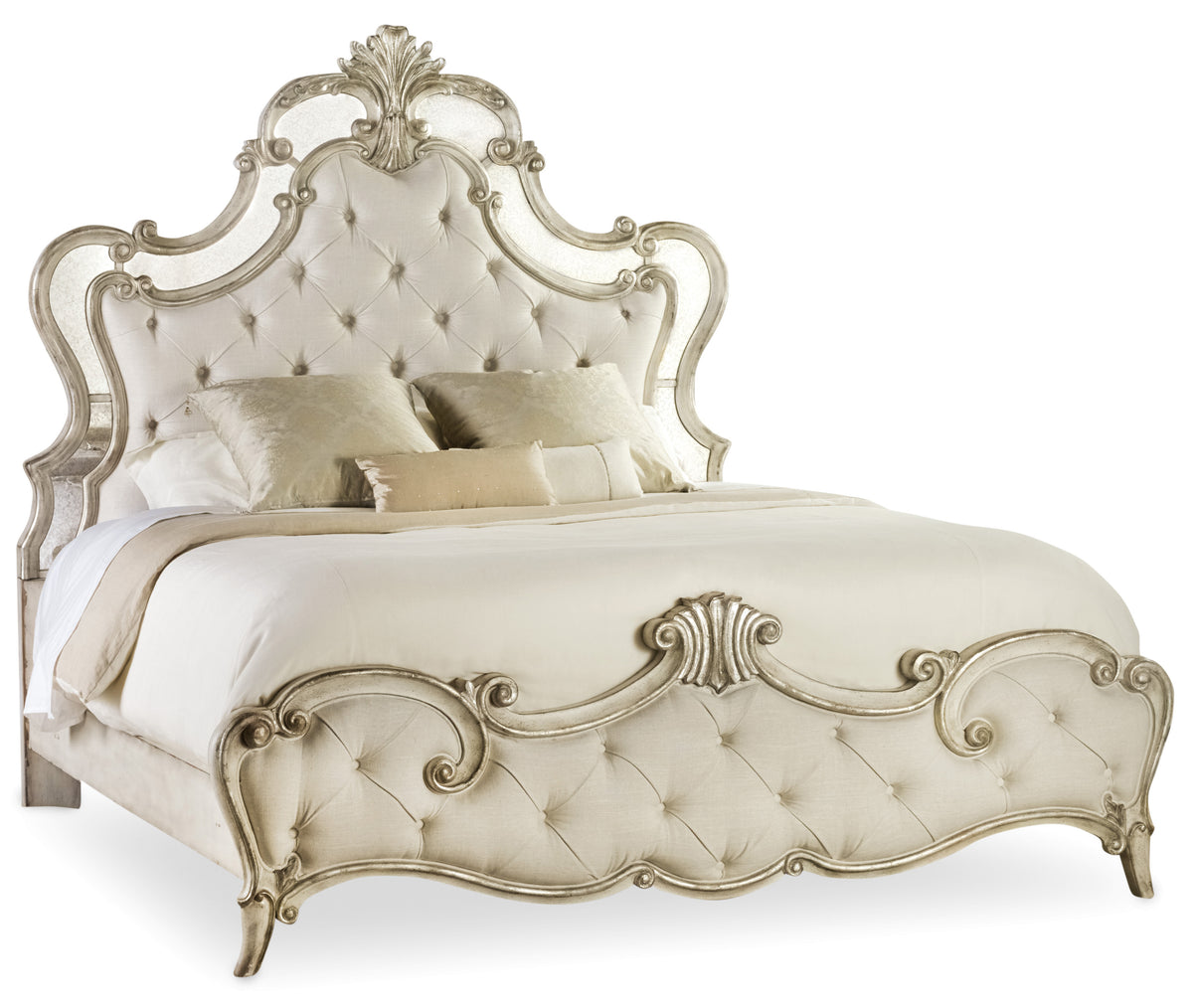 a bed with a white headboard