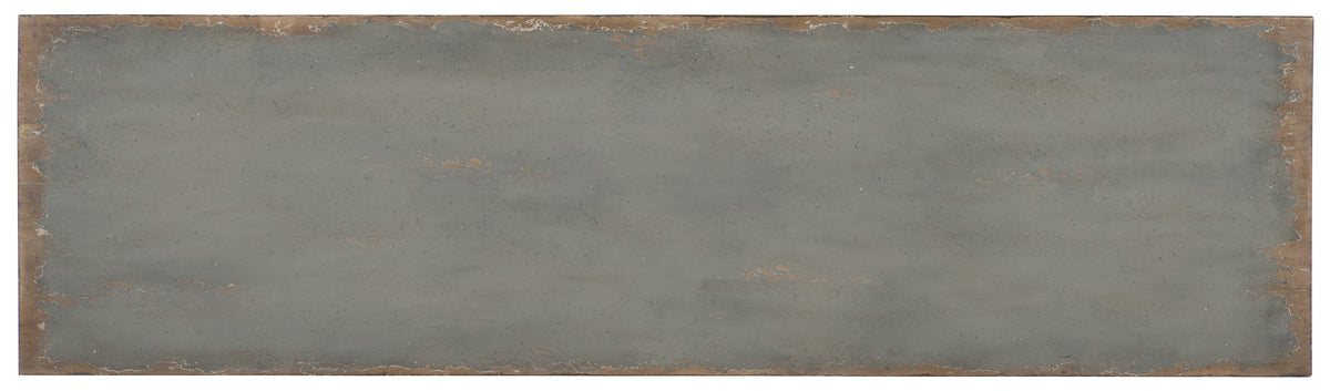 a grey rectangular sign with brown edges