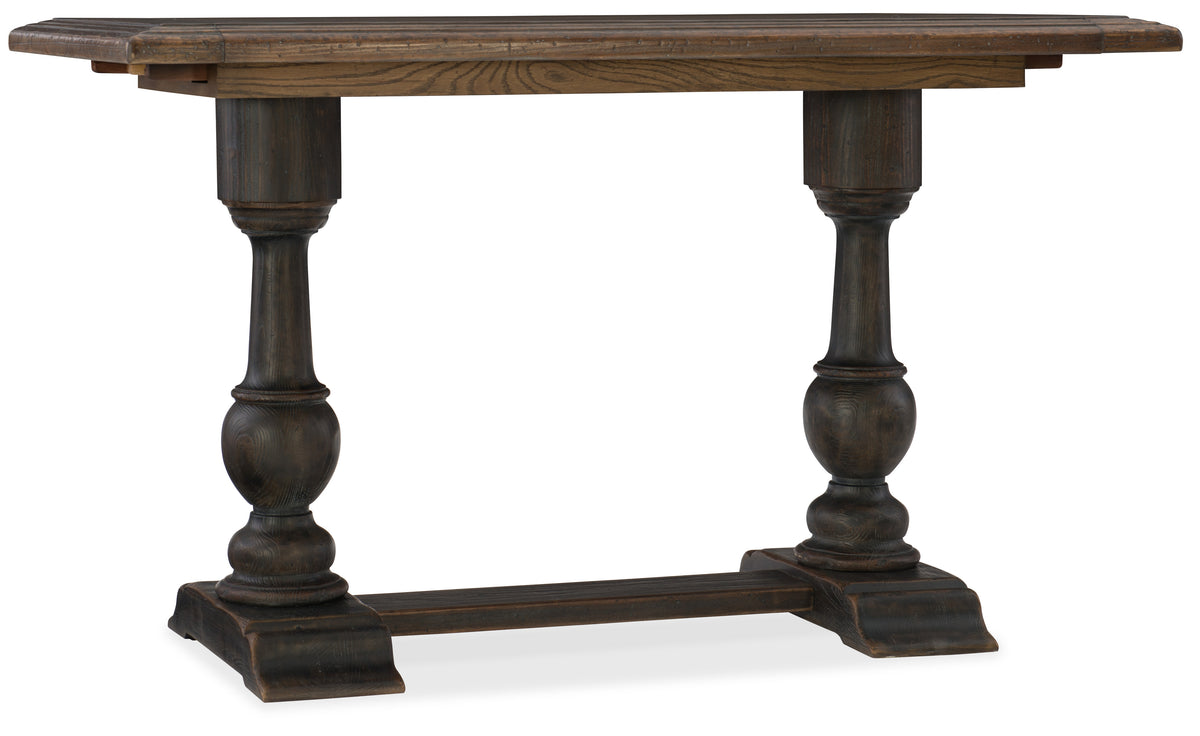 a wooden table with pillars