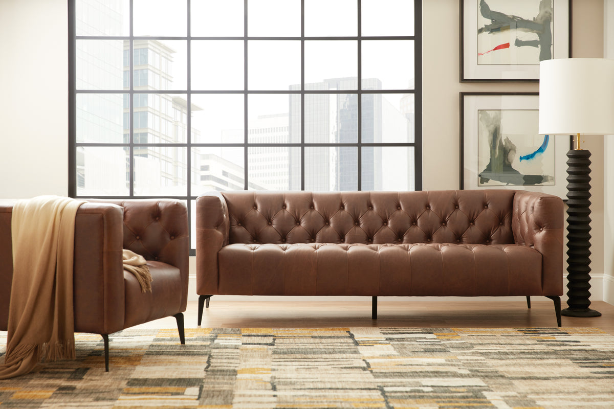 a couch and chair in a room