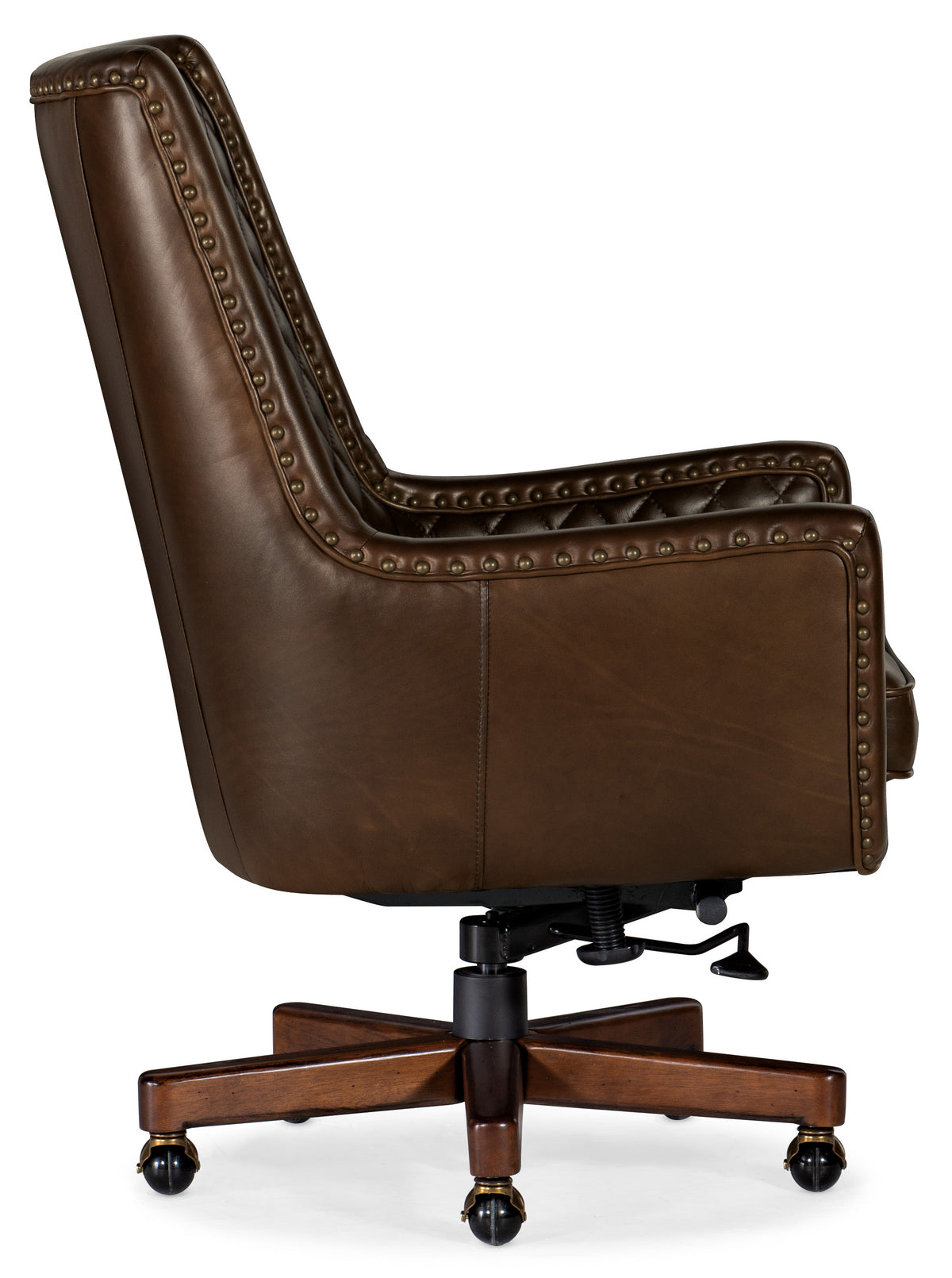 a brown leather chair with wooden legs