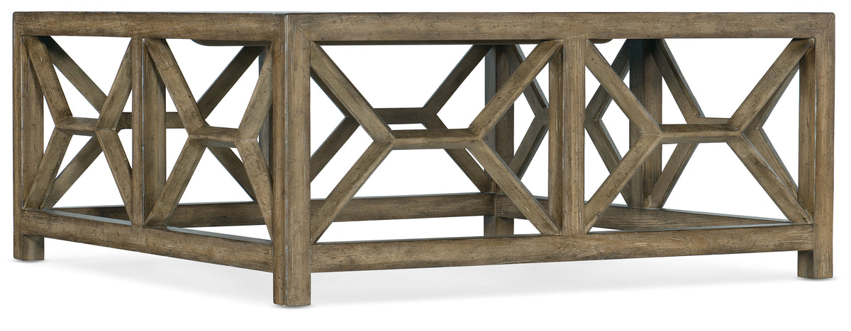 a wooden table with a rectangular design