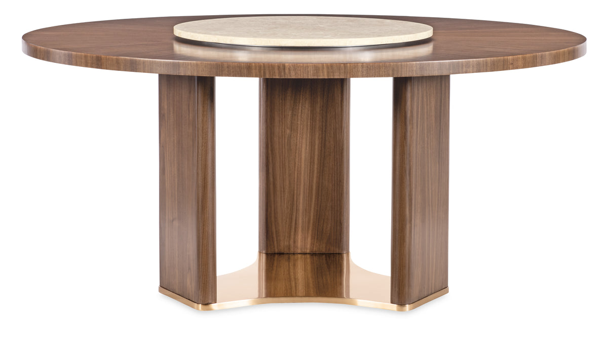 a round wooden table with a white surface