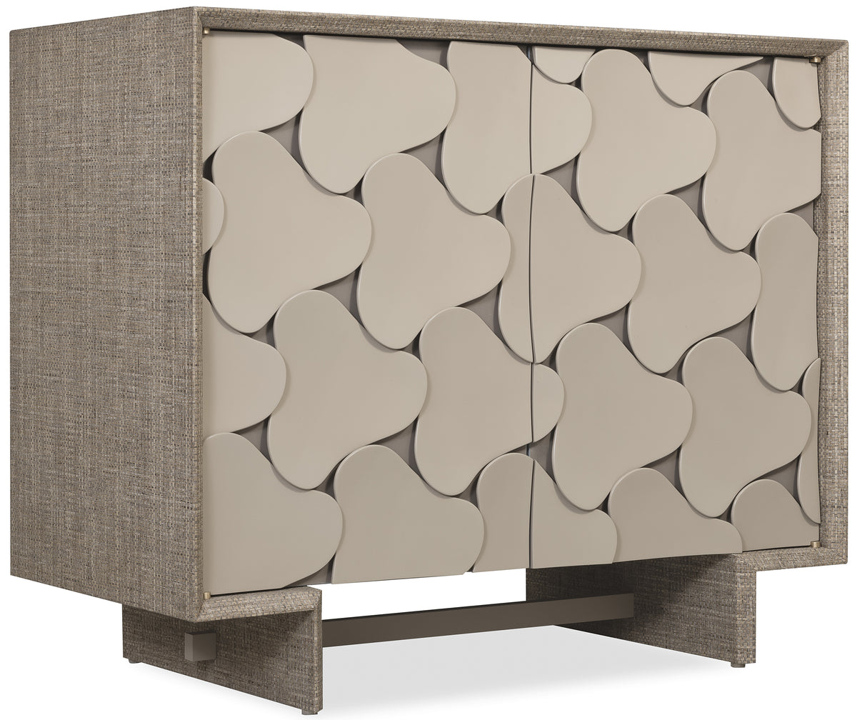 a white cabinet with a pattern on it