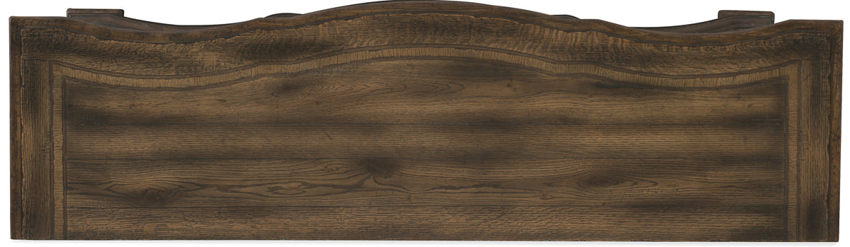 a wooden board with a curved edge