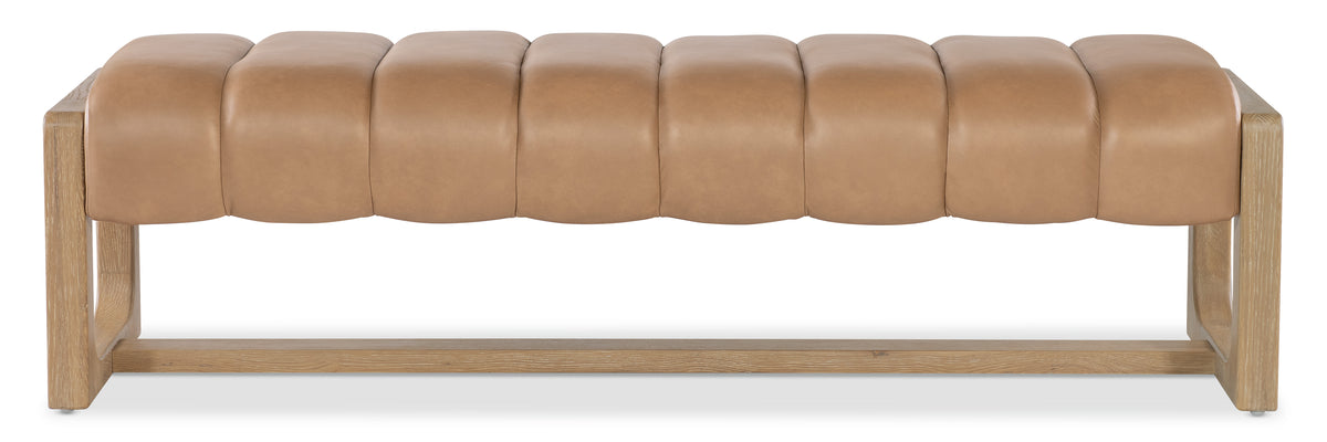 a brown leather bench with a wooden base
