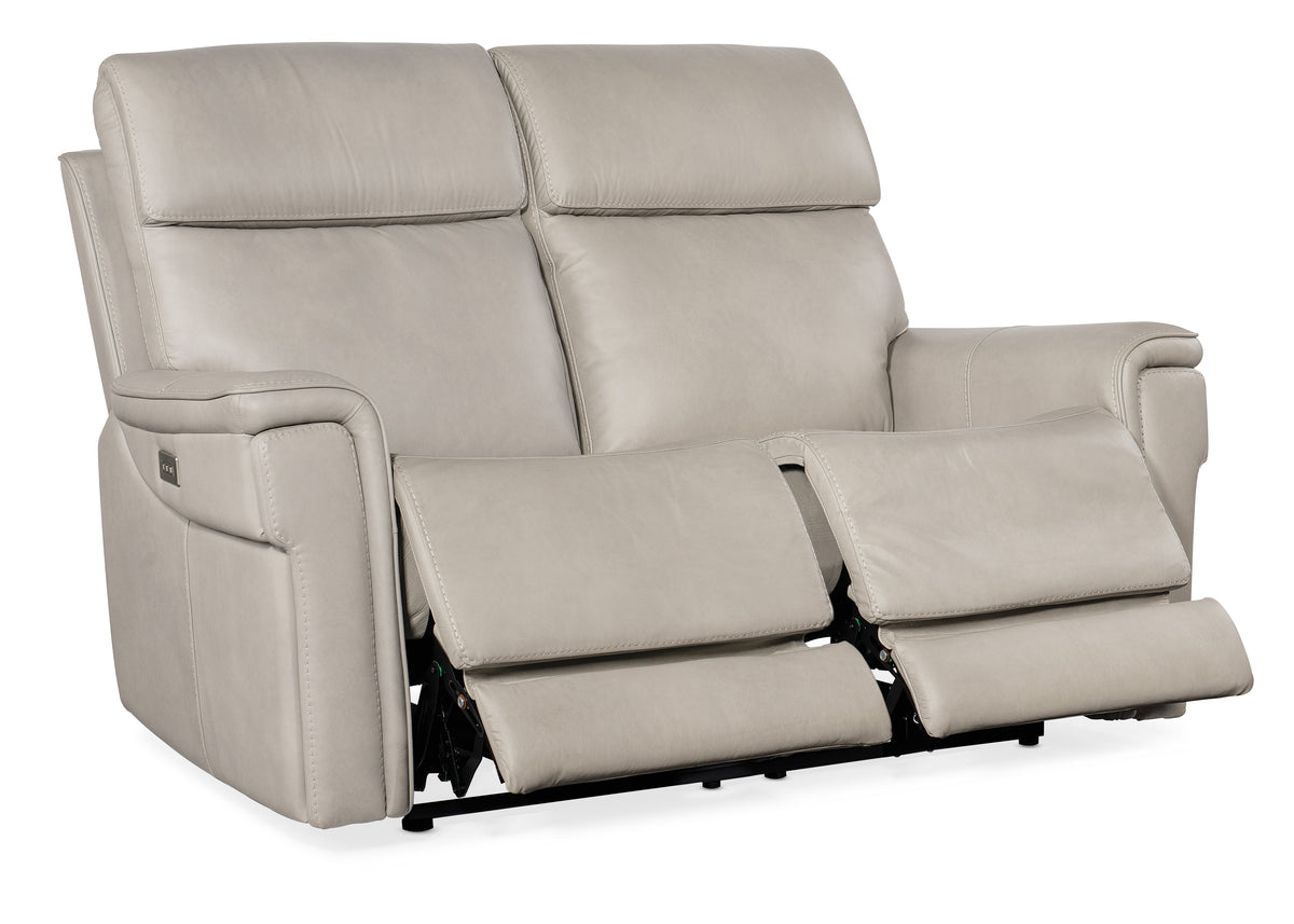 a white reclining chair with two recliners