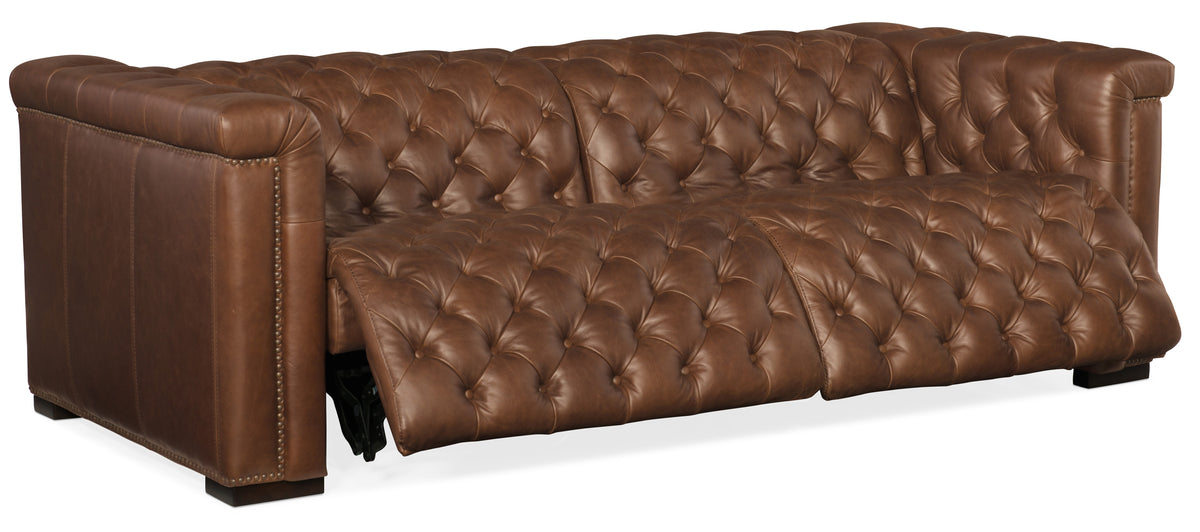 a brown leather couch with a white background