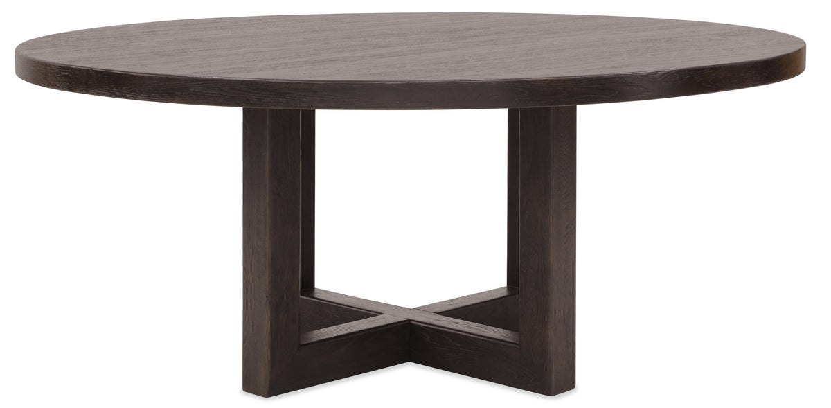 a round wooden table with a cross base
