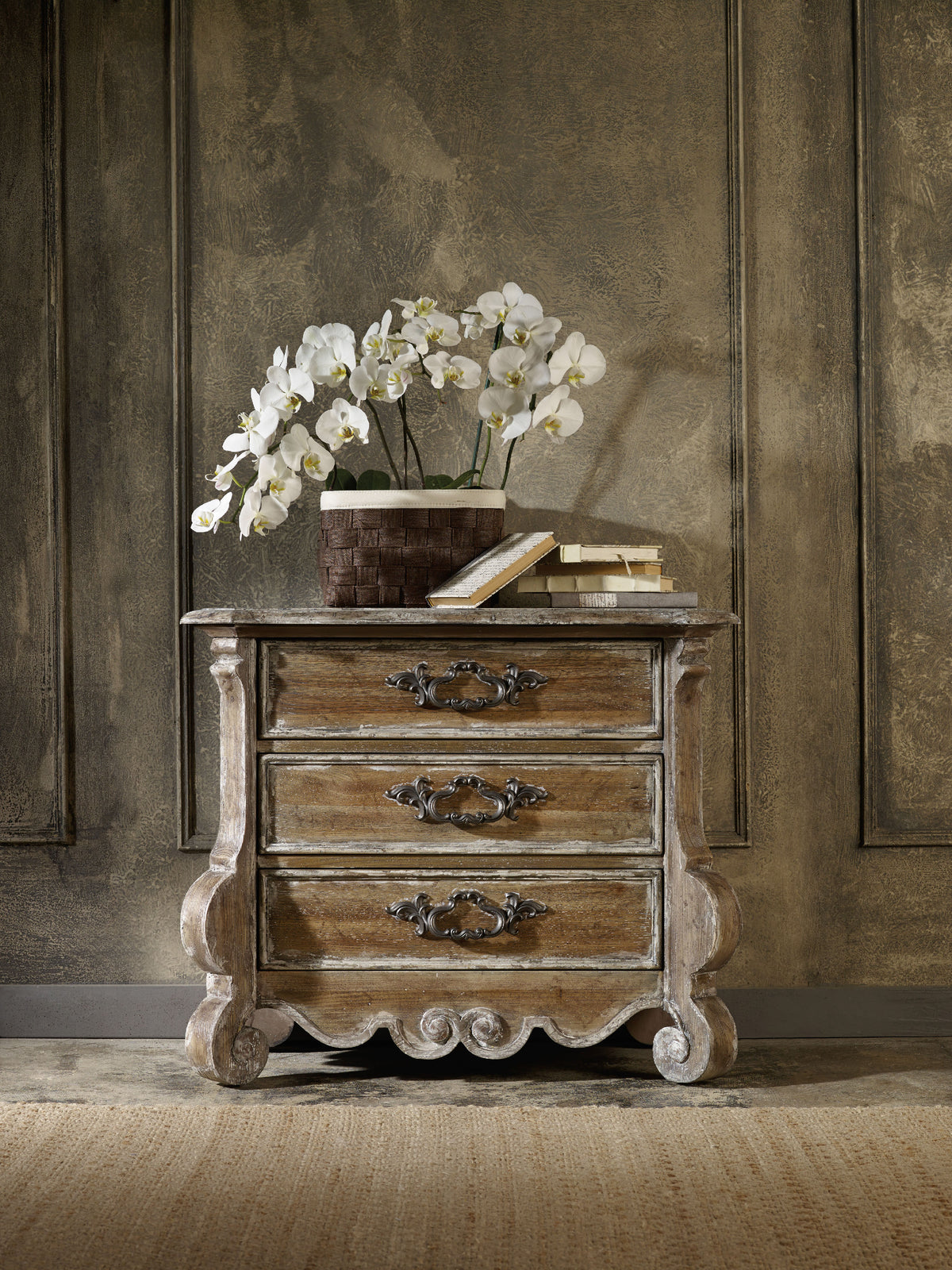 a white flowers on a dresser
