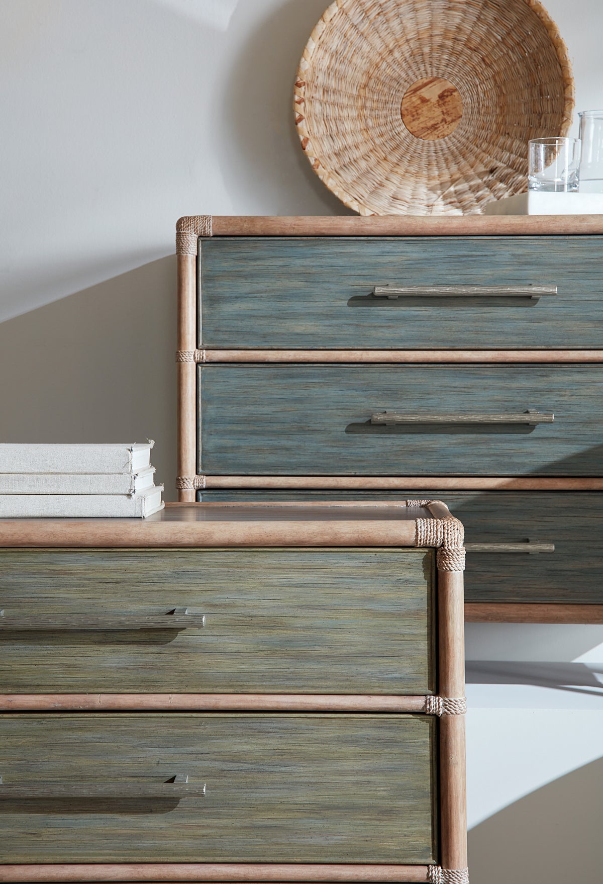a dresser next to a wall