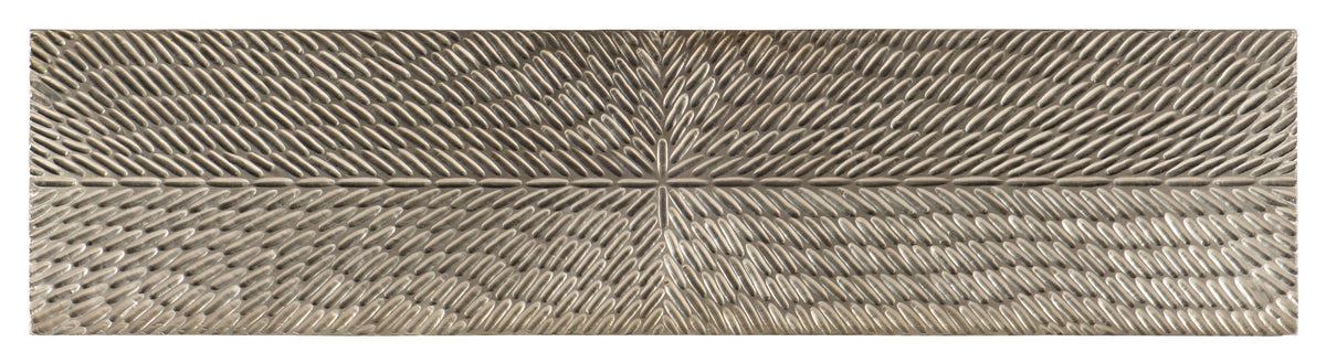 a metal plate with a design
