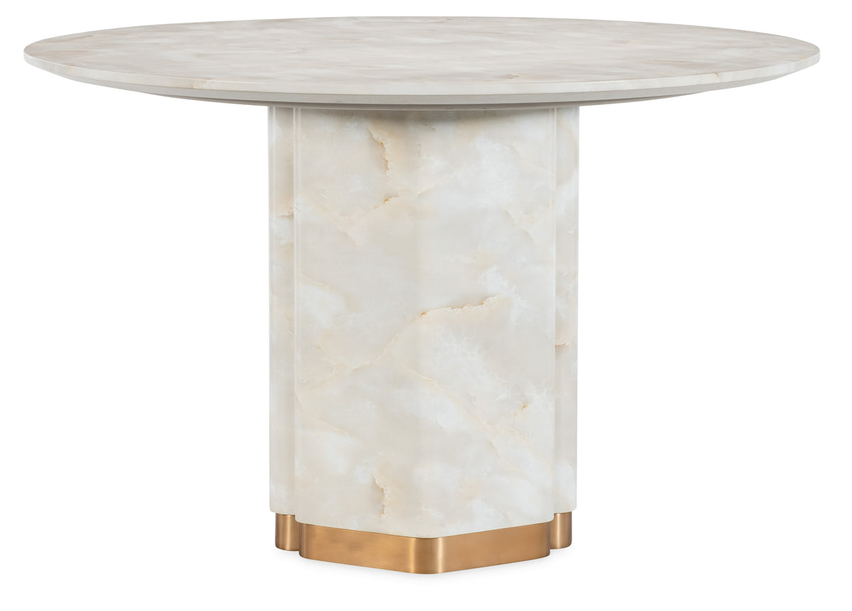 a marble table with gold base