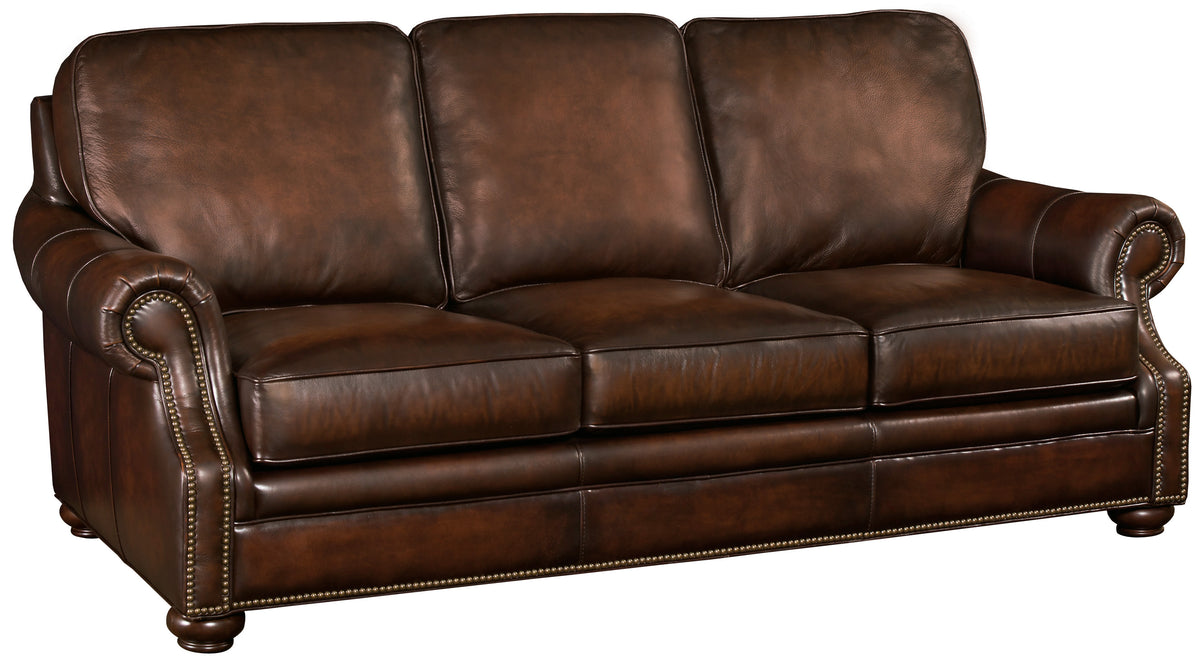 a brown leather couch with a white background