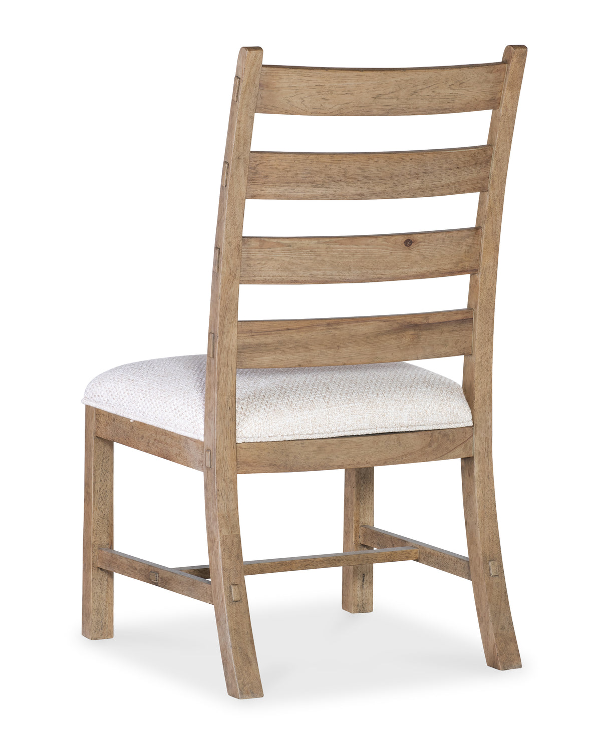 a wooden chair with a white cushion