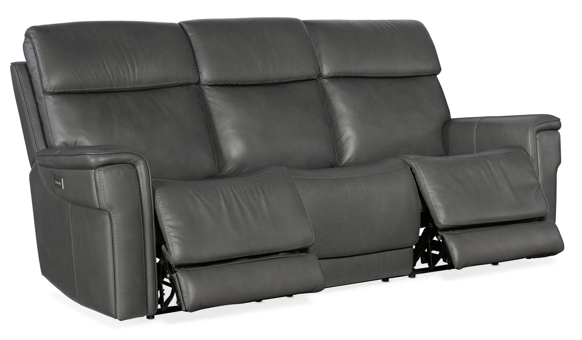a grey leather reclining sofa