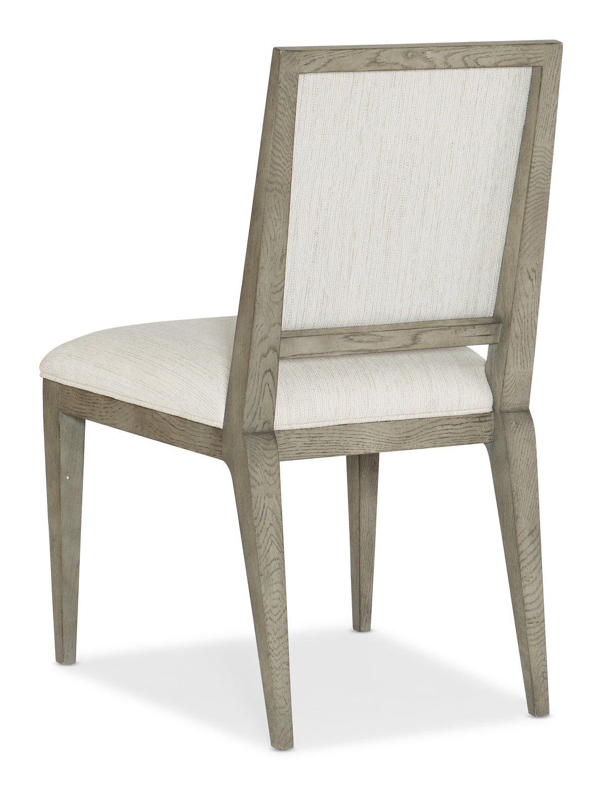 a chair with a white cushion