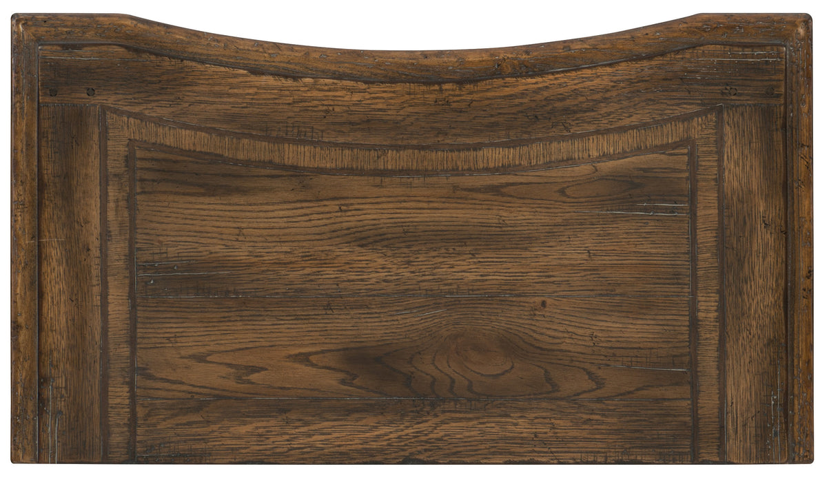 a wooden board with a curved edge
