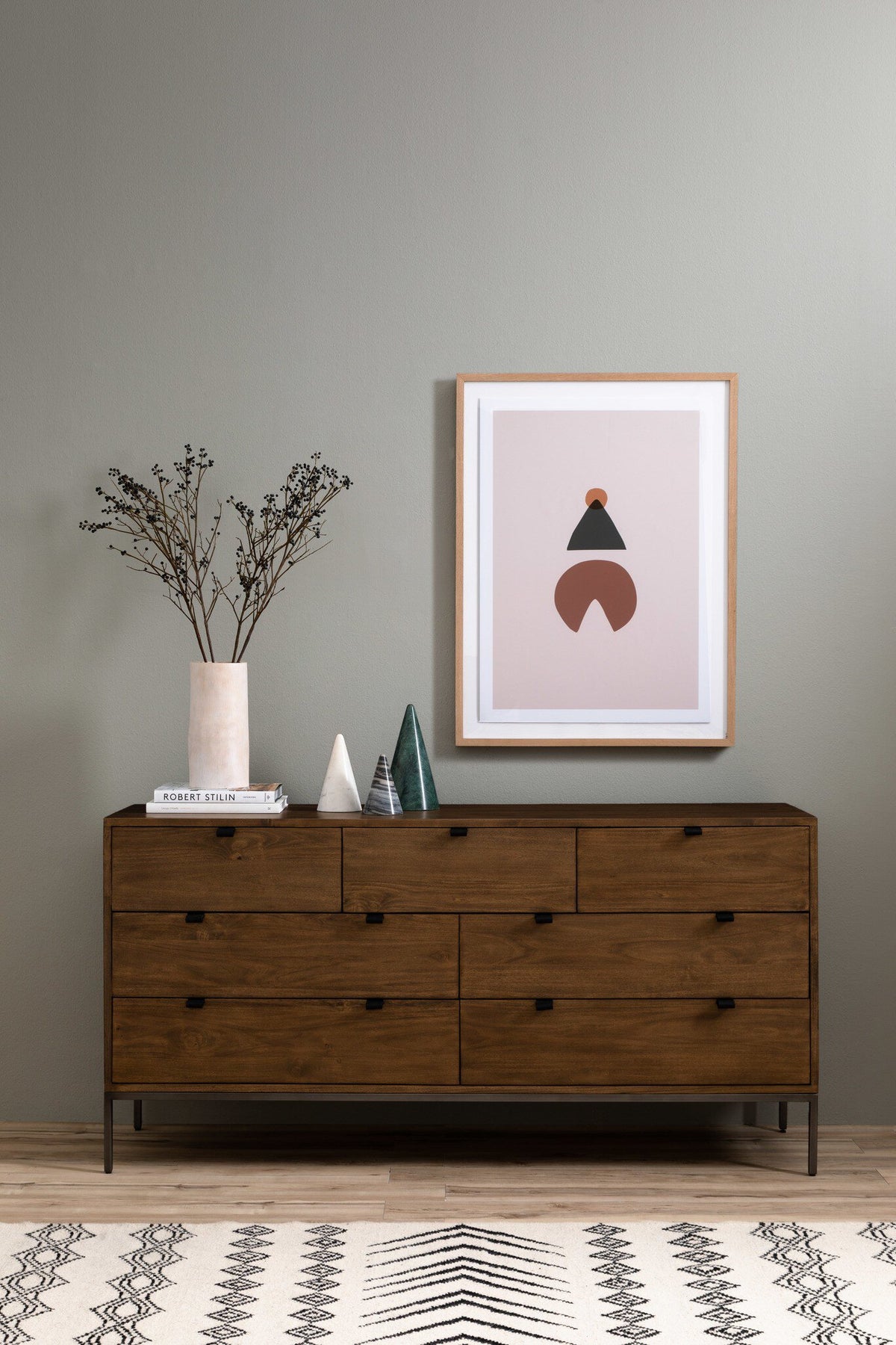 a picture on a dresser