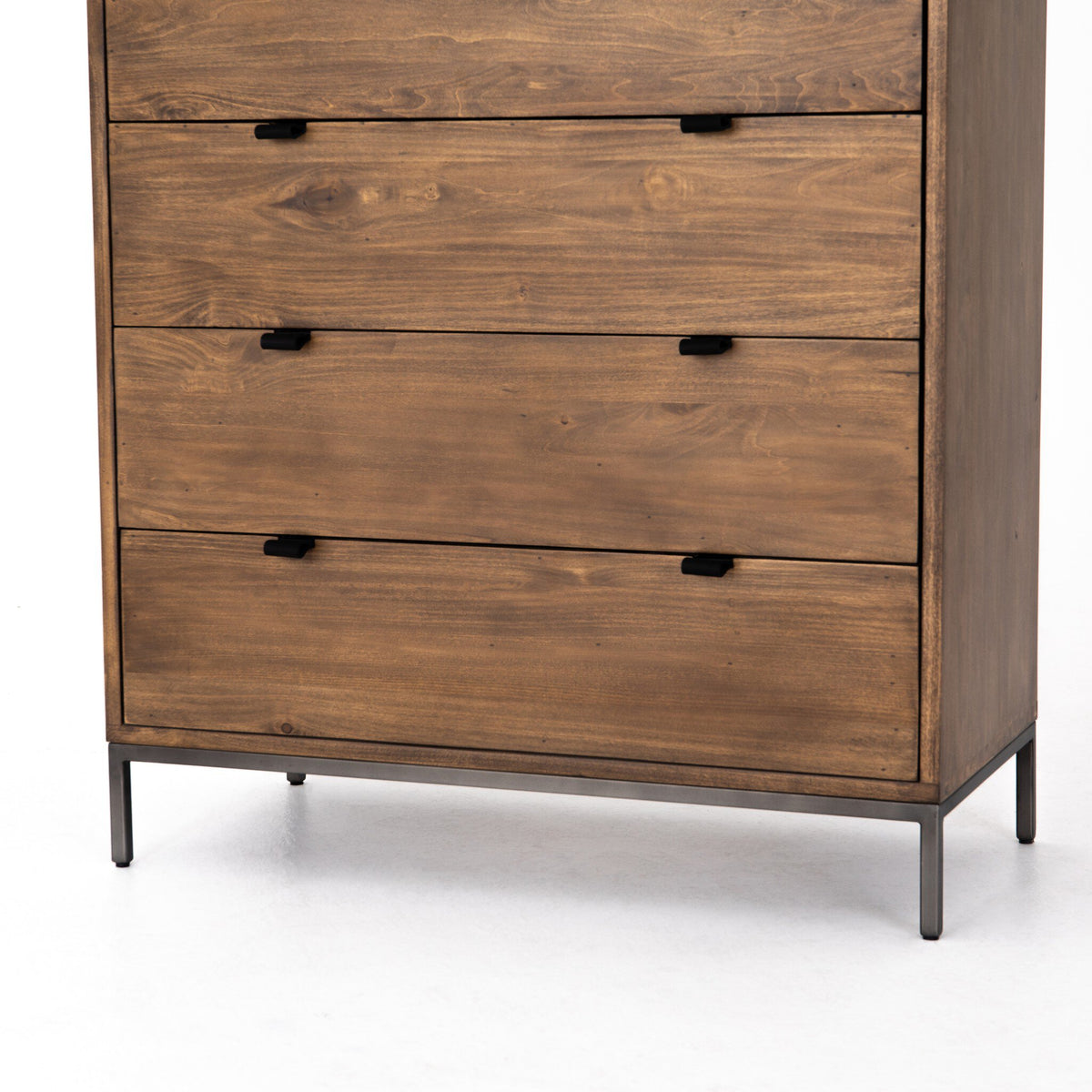 a wooden dresser with black handles