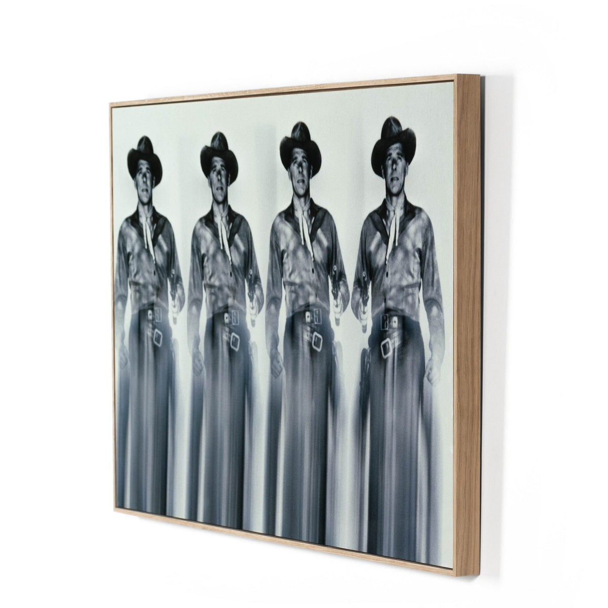 a framed picture of a group of men wearing cowboy hats