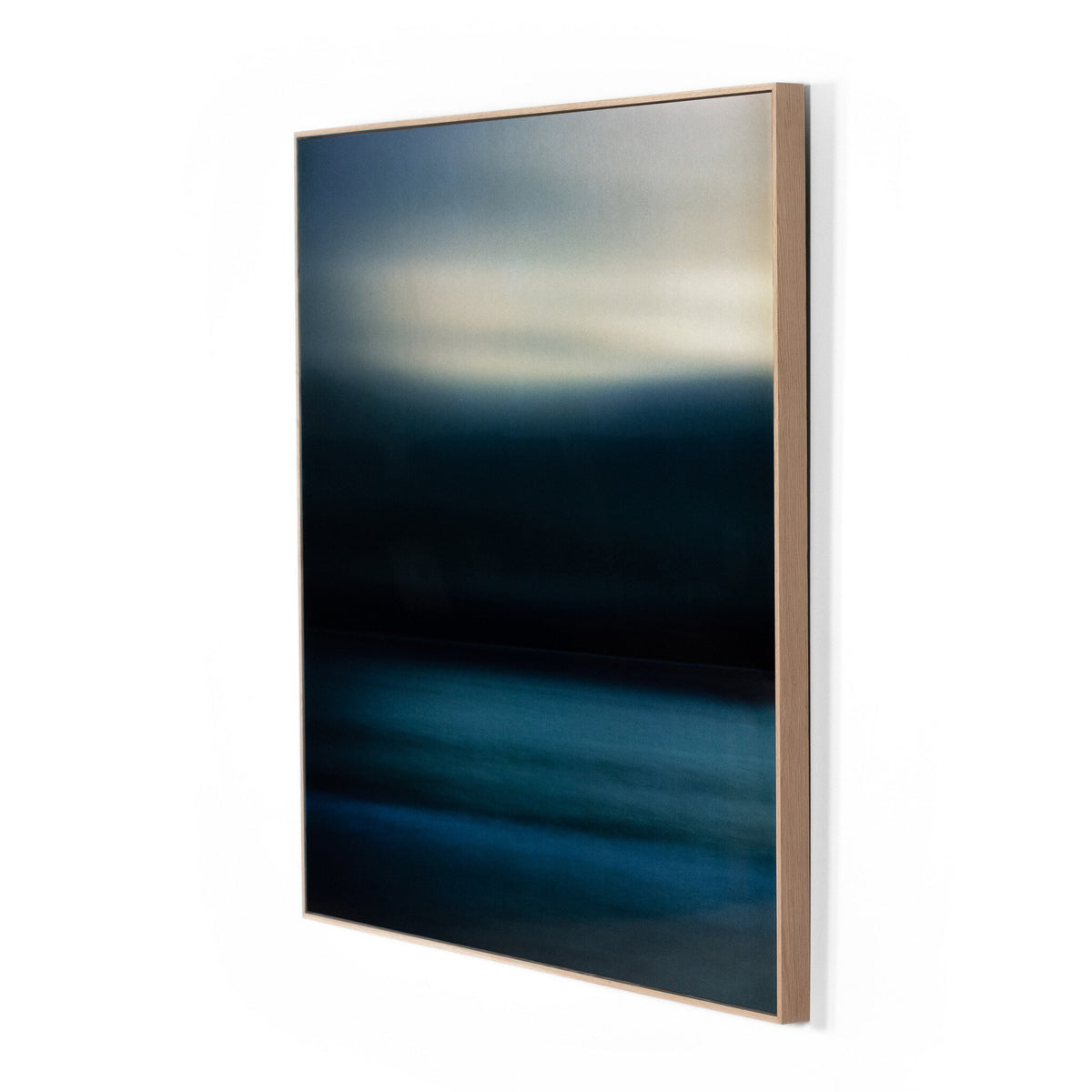 a framed picture of a blue sky