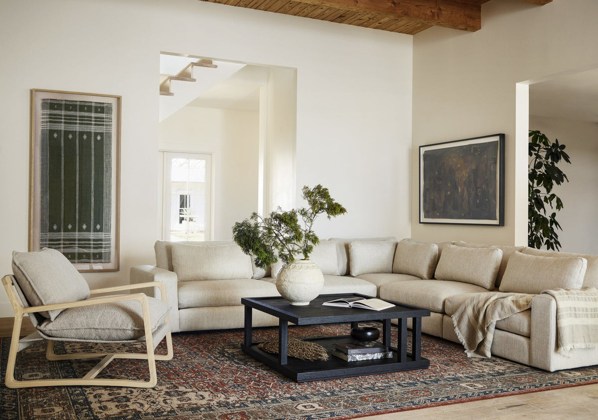 a living room with a couch and a coffee table