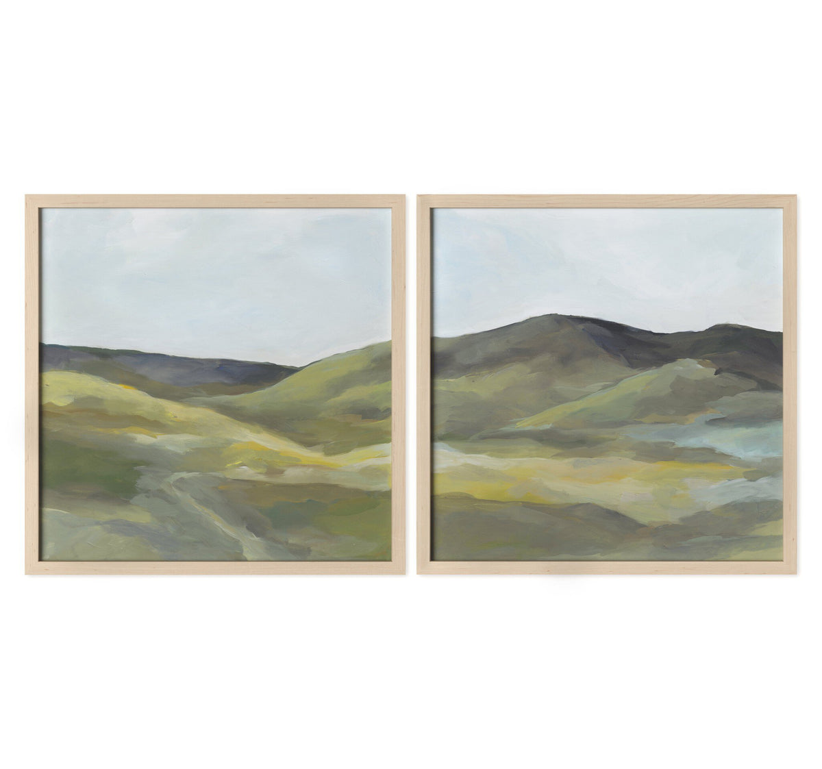 two framed pictures of hills