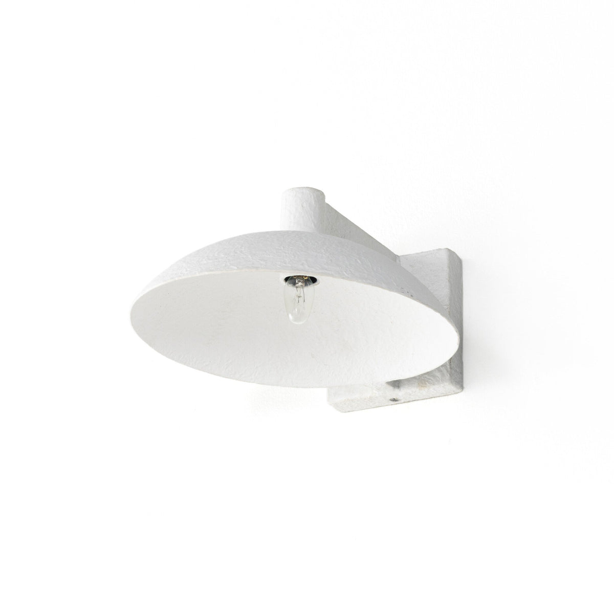 a white light fixture on a white background