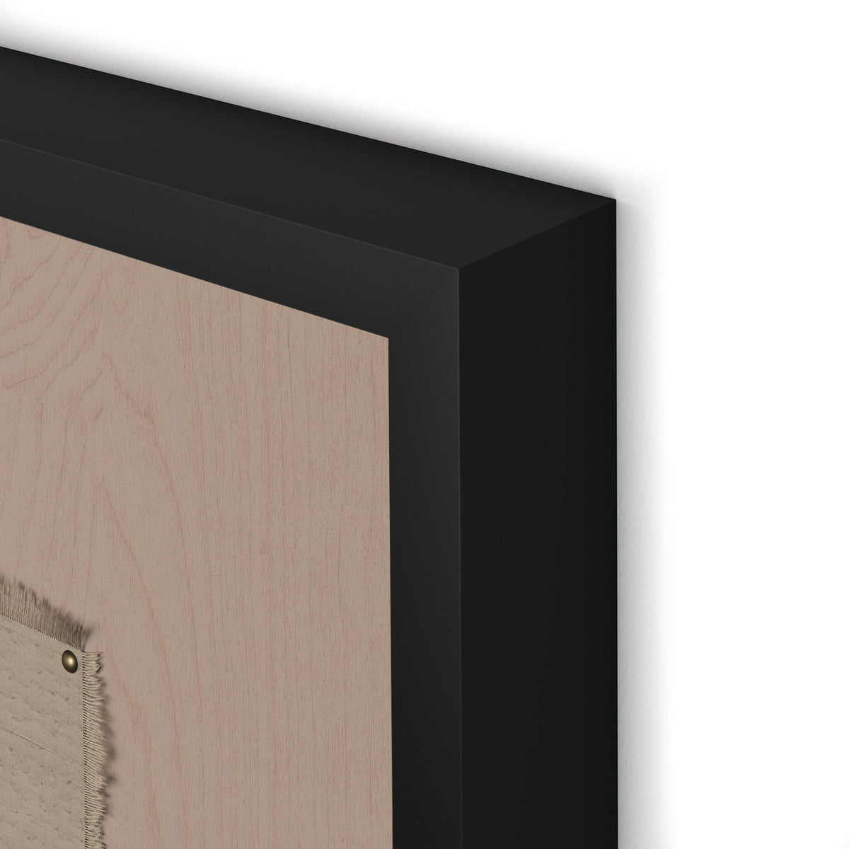 a black frame with a piece of fabric on it