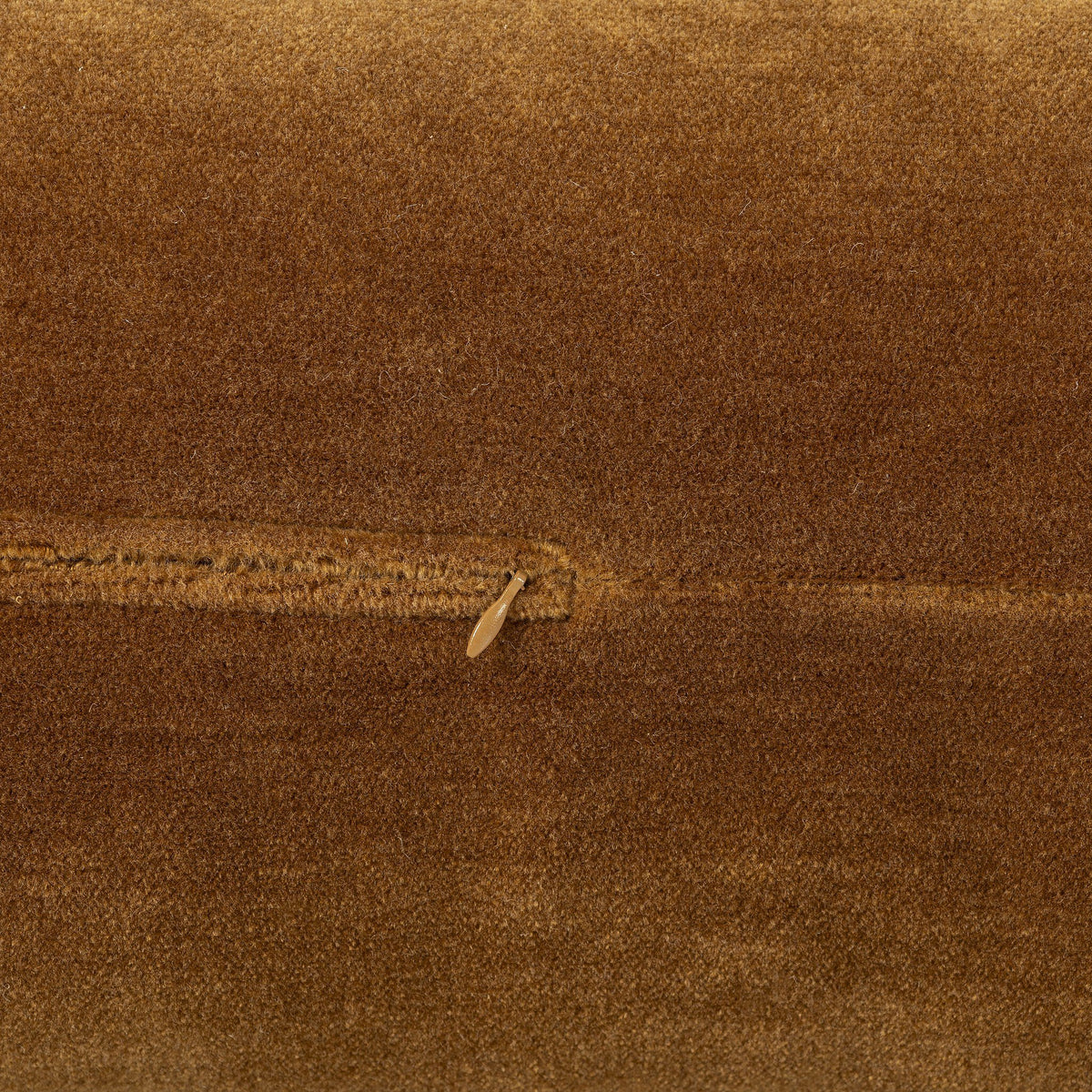 a sand with a small object in it